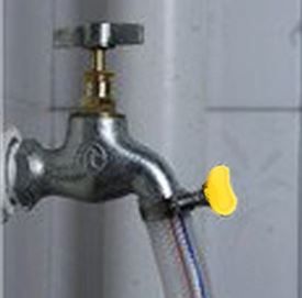 Tap with hose.JPG