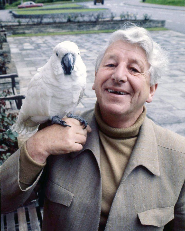 johnny morris with brolly.jpg